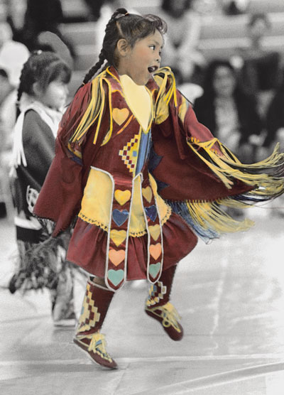 
Winter hand-colored the young dancer in her black-and-white "Pow Wow I."
